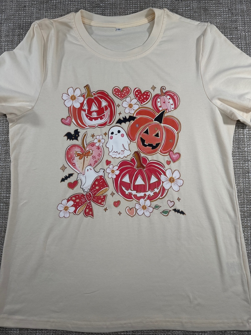 Woman’s Cream Halloween Pumpkin Graphic Tee